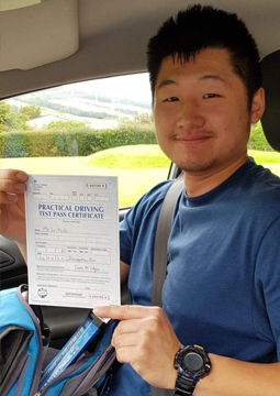 Li-Ming passing his driving test on the 26th August 2022.
